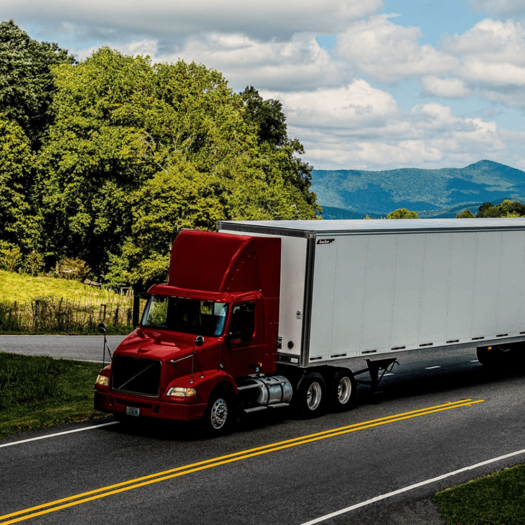 En la imagen se muestra un camión rojo de la marca Great Dane