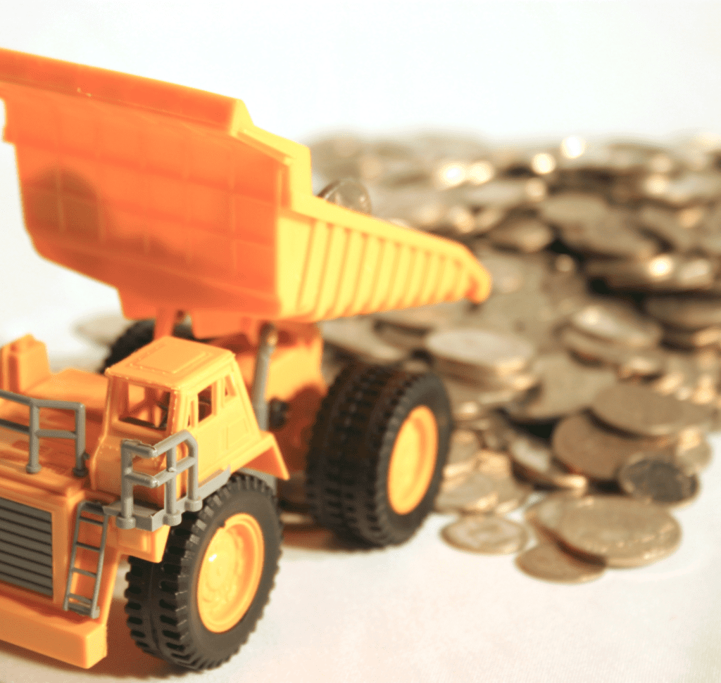 En la imagen se muestra un camión con monedas